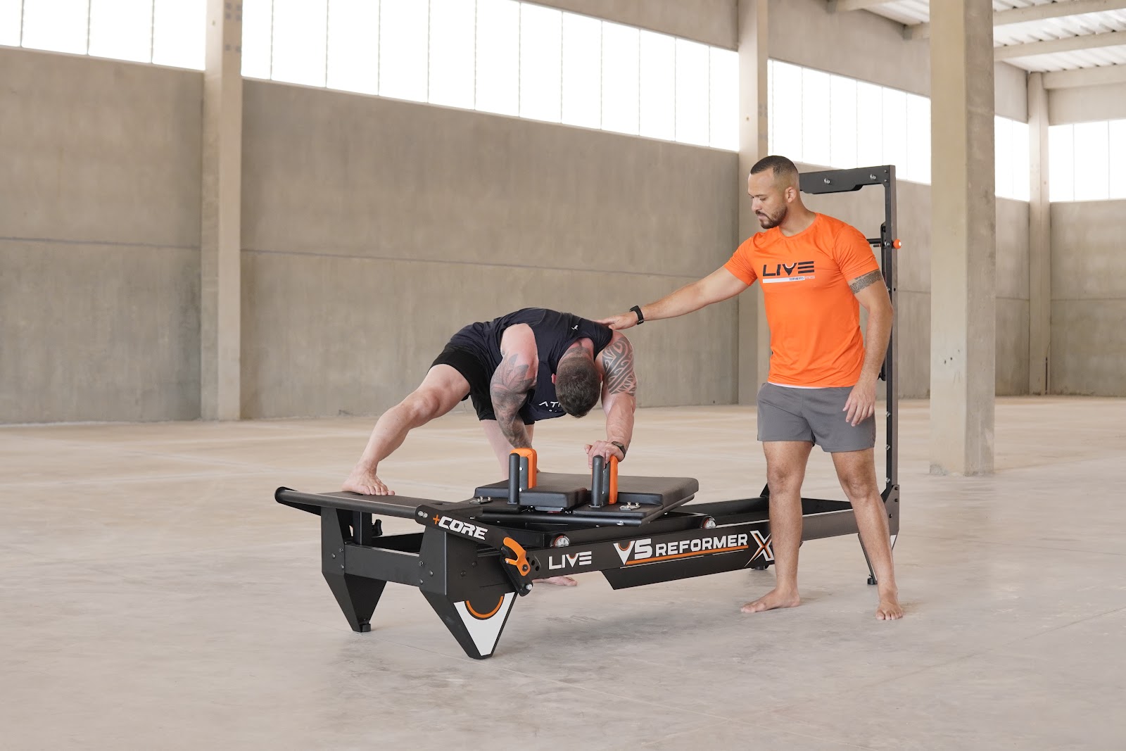 Professional Pilates studio floor equipped with Live reformers